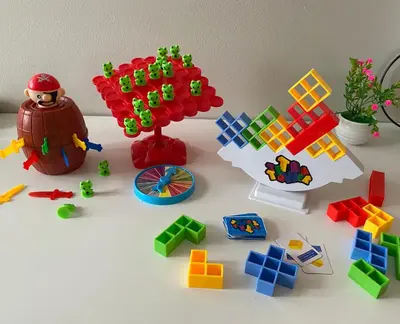a table with a bunch of plastic toys on it at Cozy Blossom near NAIA in Manila