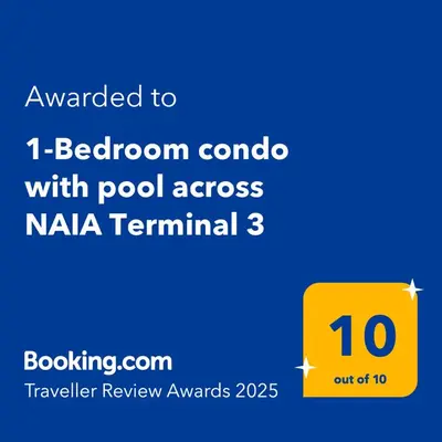 a yellow sign with the number on it at 1-Bedroom condo with pool across NAIA Terminal 3 in Manila