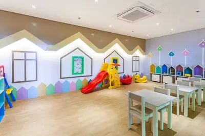 a childrens play room with a slide and play equipment at The Peaky Blinder s Crib with Gym, Pool, Sauna More in Manila