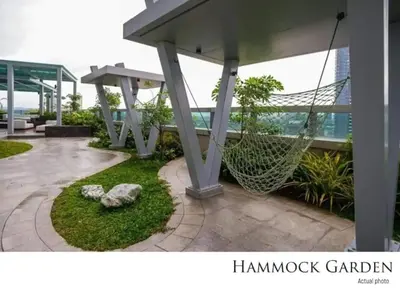 a hammock garden on the roof of a building at The Oasis 1 BR with Pool Sauna Gym and More in Manila