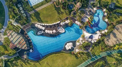 an aerial view of a resort with a swimming pool at AZURE Urban Resort Residences Paranaque City in Manila
