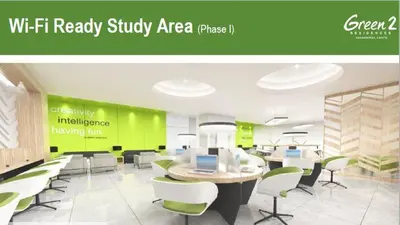 a green office with a table and chairs at HabbsVille at Green 2 Residences by SMDC Dasmarinas Cavite in Dasmariñas