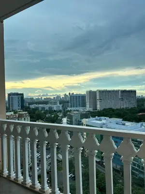 a view of a city from a balcony at COZI Venice Luxury Residences Alessandro BGC w Pool Gym in Manila