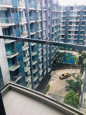a view from the balcony of a building at Two Palm Tree Condotel in Manila