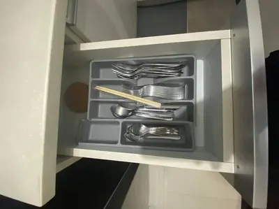 a drawer filled with utensils in a refrigerator at 1BR Premium condo - Twin Oaks Pl PANORAMIC VIEW in Manila