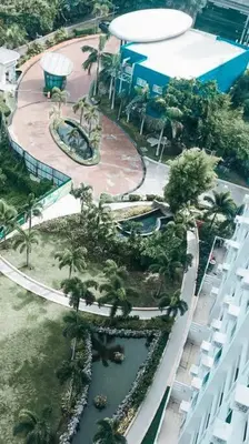 an aerial view of a swimming pool in a resort at Cozy aesthetic stay near Alabang in Manila