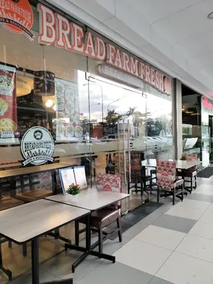 a breakfast farm fresh restaurant with tables and chairs at Comfy 42 shore 3 Residence Free parking, Near Airport, IKEA, MOA, Pasay City in Manila