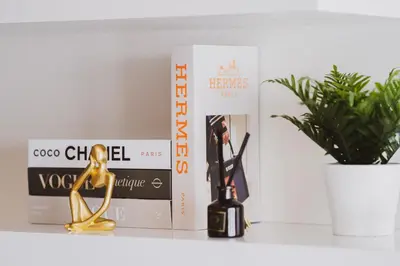 a shelf with a bottle of wine and a plant at Modern Living 3 Makati in Manila