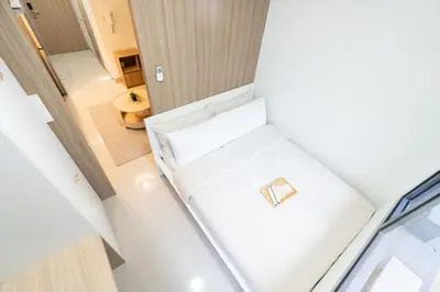 an overhead view of a living room with a white couch at Modern Living 4 MOA Pasay in Manila
