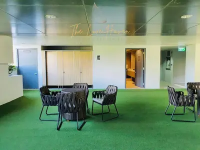 a conference room with chairs and a table in the middle at The Luxe Haven Shore 3 Residences in Manila