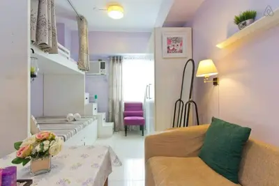 a small living room with a couch and a living room at Condo Studio Luxe in Princeton Residences in Manila