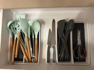 a drawer filled with lots of utensils at Mi Casa en Manila in Manila