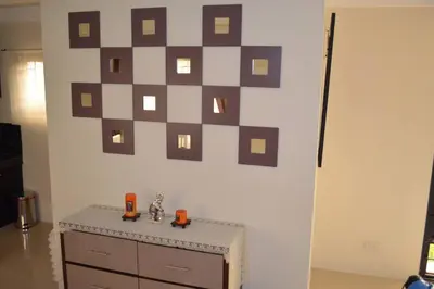 a room with a wall with a picture on the wall at Home in Pasig in Manila