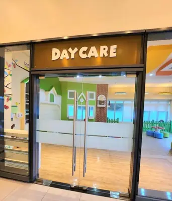 a display window of a day care store in a mall at BGC Cosy Hotel Vibe Uptown Parksuites Studio in Manila