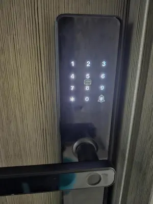 a close up of a door with a door knob and a mirror at 5F J Phase1 Sevilla in Manila