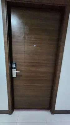 a wooden door with a telephone in a room at Makati Air Luxury Package - Laugh Sleep Brunch Surf 300 mbps Fast in Manila