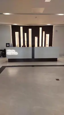 a showroom with a counter with lights on it at Covent Garden South Residences in Manila
