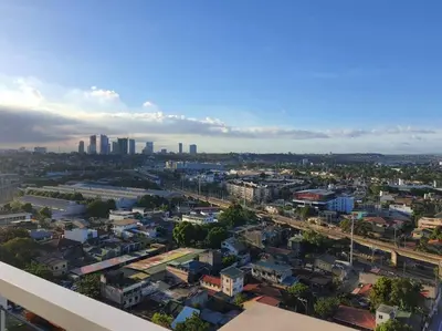 an overhead view of a city with skyscrapers at Helaena's Scandi Haven in Manila