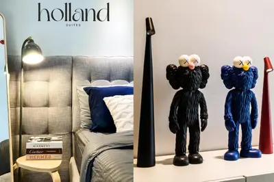 a room with a bed with a statue on a table at Mall of Asia Shore 3 Residences Holland Suites in Manila