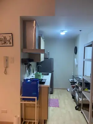 a kitchen with a sink and a counter top at SOHO Central 1 Bedroom with Balcony near MRT EDSA SHAW PIONEER Greenfields SM Megamall Ortigas in Manila