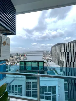a view of the city from the top of a building at QUITE Euro Luxe 3BR 7 mins walk to high street in Manila
