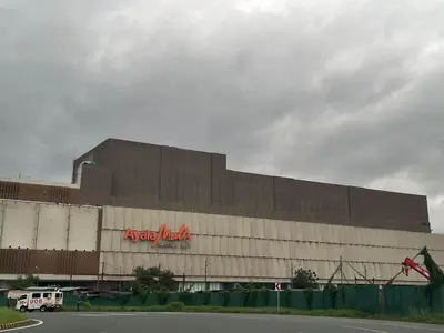 a large building with aania meat sign on the side at Gentry Manor Family Suite Balcony City View WiFi Netflix close to Okada 12B in Manila