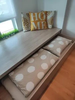 a bed with two pillows and ahiemetery at Oak Apartment at The Rochester Bridgeview Tower in Manila