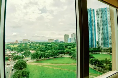 a view from a window of a city at Spacious 2BR at SoMa BGC Near SM Aura and Bonifacio High Street in Manila