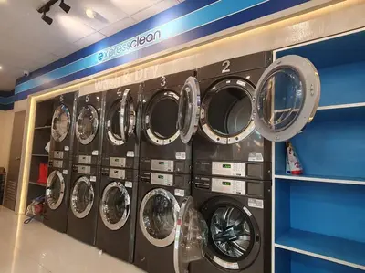 a bunch of washing machines in a laundry room at Red Residence Makati-Cozy Condo Unit with Balcony in Manila