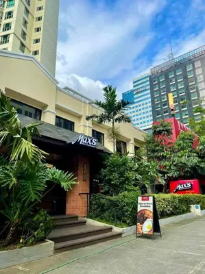 a building with a sign in front of it at Avant at the Fort BGC 1BR Flr to Ceiling Cor Unit with Great View in Manila
