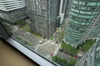 an aerial view of a city with tall buildings at Avant at the Fort BGC 1BR Flr to Ceiling Cor Unit with Great View in Manila