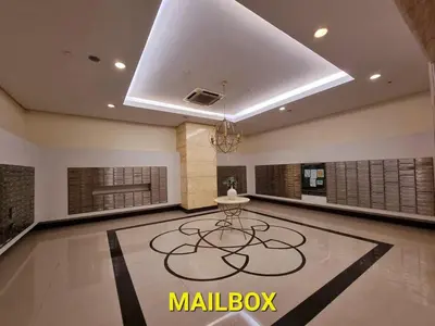 a large living room with a table in the middle at Elegant Venice Condo Mckinley Hill BGC #vlrtc5i in Manila