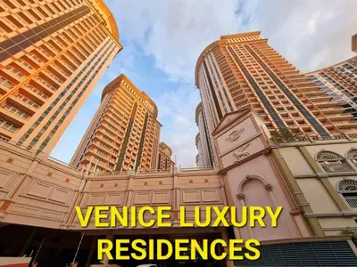 a group of tall buildings with the words venice luxury residences at Elegant Venice Condo Mckinley Hill BGC #vlrtc5i in Manila