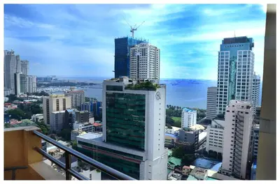 a view of a city with tall buildings at Brianna's haven property rental in Manila