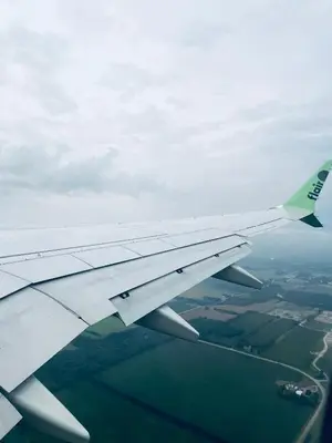 a view of the wing of an airplane at DJ Apartment in Manila