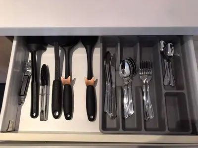a bunch of utensils in a drawer at Amazing 1 bedroom with pool, gym and stunning view at heart of Makati in Manila