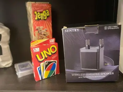 a table with a box of chips and a box of snacks at 1BR CONDO Fame Residences Mandaluyong- Be My Guest Staycation- Near SM Megamall, Greenfield District, & Ortigas in Manila