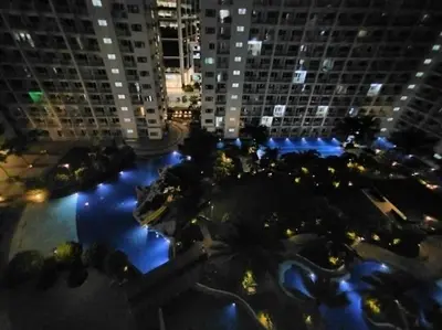 an aerial view of a river in a city at night at Spacious 2-BR Condo - Shore Residence Tower D - Walking distance to Moa in Manila