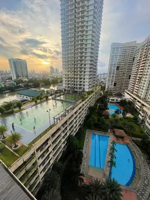 an overhead view of a tennis court in a city at Luxury Bauhaus inspired apartment near Makati in Manila