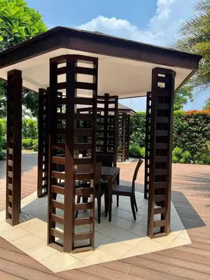 a gazebo with a table and chairs under it at 2br condo in Southmall Las Pinas 25 mins to NAIA - 709T3 in Manila
