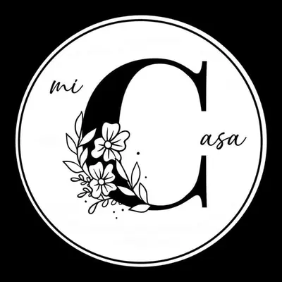 a white letter c with flowers and a sign at Mi Casa - Cozy Studio with FREE access to Fitness Centre, swimming pool and stunning City View located near the CBD of Ortigas, Makati, BGC in Manila