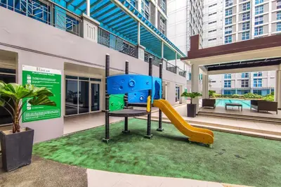 a playground in a building with a slide at Japanese Stylish Condo in Makati in Manila