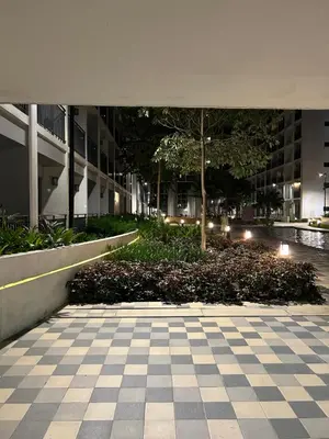 a building with a checkered floor in a courtyard at Shore 2 Residences Tuscia Home Staycation in Manila