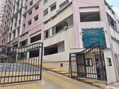 a building with a sign in front of a building at 2 Bedroom condo unit in Manila