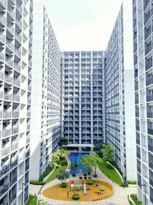an aerial view of two tall buildings with a courtyard at 1BR Balcony Luxury Condo Shore 2 Near MOA & NAIA in Manila