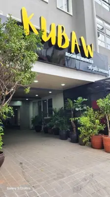 a building with a walazon sign on the front of it at Playful comfort and Serene relaxation in Cubao in Manila