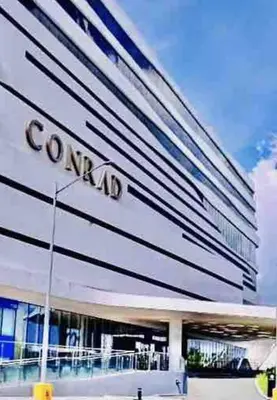 a building with a sign on the side of it at Near MOA Manila Bay Airport via NAIAX Balcony WiFi SHORE#3 Residences in Manila