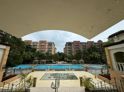 a view of a swimming pool in a building at Kalizta Suites in Manila