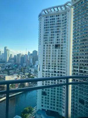 a view of a tall building in a city at The Home Ikigai in Manila