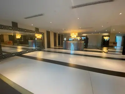a bowling alley with a man standing in the middle at The Home Ikigai in Manila